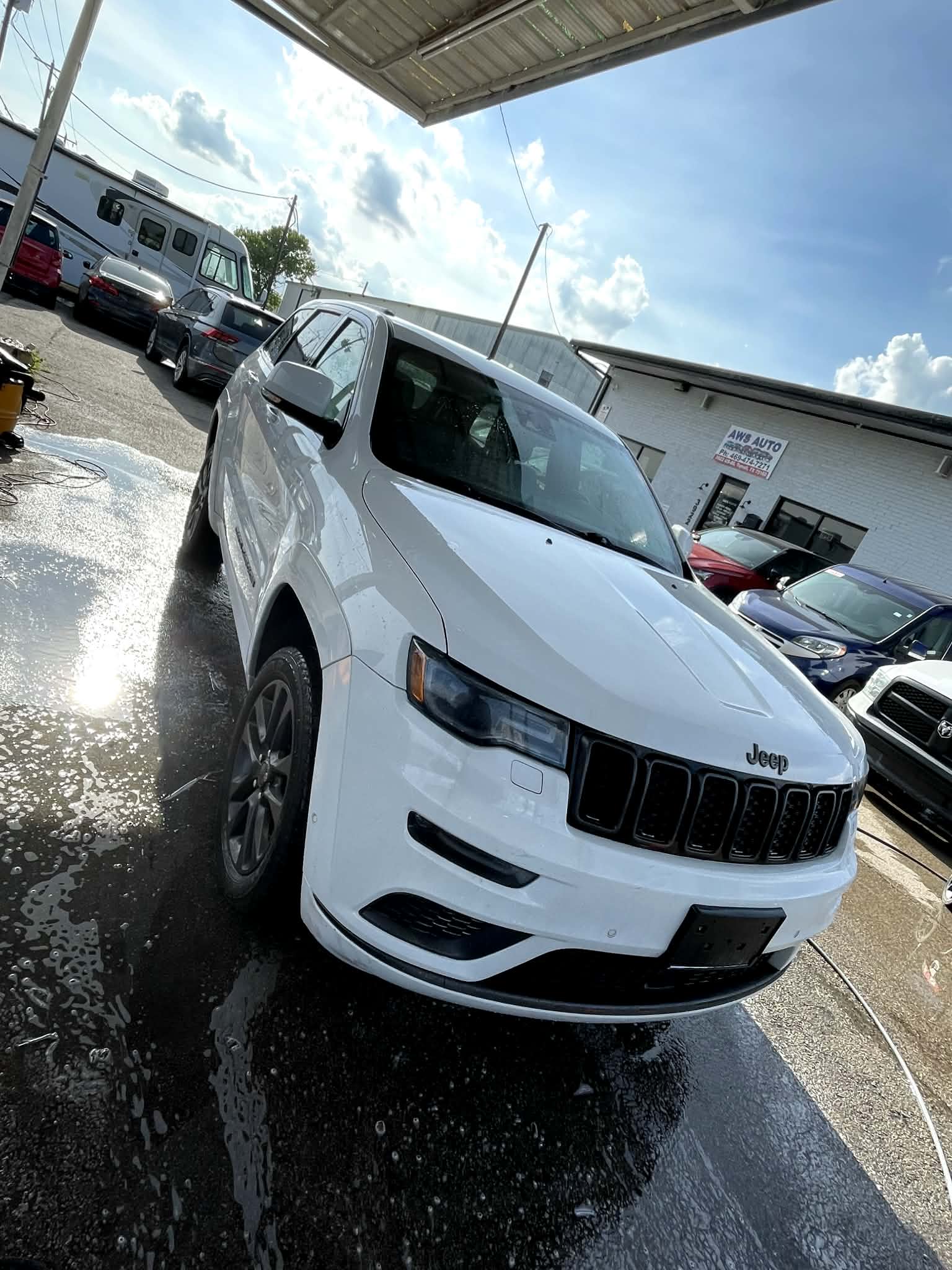 Jeep Grand Cherokee getting washed in the bay